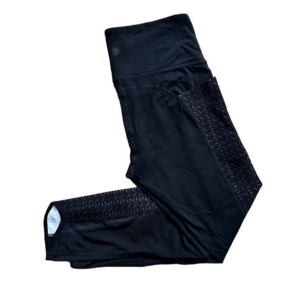 Athleta Pants - Athleta cropped black leggings w pocket & textured pattern side panel - size S